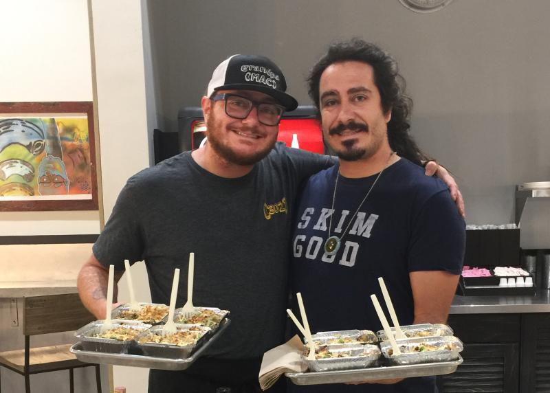 Hari, left, and Orion Cameron pay homage to their grandfather, Cameron McCurdy, at their Grandpa MAC restaurant on The Highway north of Rehoboth. The place is as informal as it is creative. SUBMITTED PHOTO